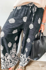 Black Plus Size Geometric Ethnic Print Drawstring Wide Leg Pants - MarkoFit