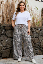 Khaki Plus Size Leopard Print Raw Edge Patch Pocket Drawstring Loose Pants - MarkoFit