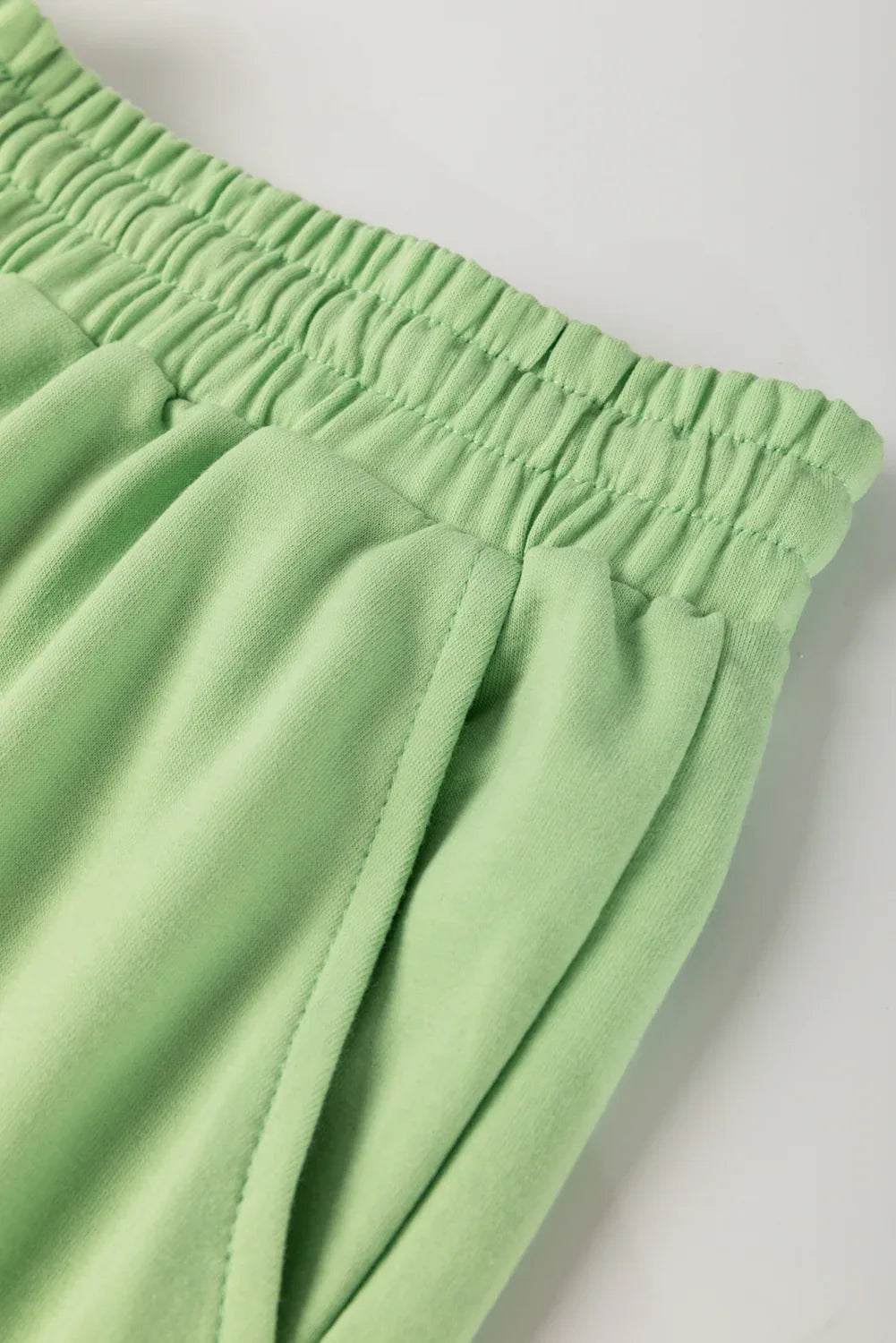 Meadow Mist Green Plus Size V Neck Drop Shoulder Tee Loose Shorts 2pcs Outfit - MarkoFit